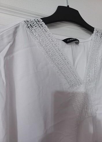 40 Beden beyaz Renk Bluz M-L uyumludur