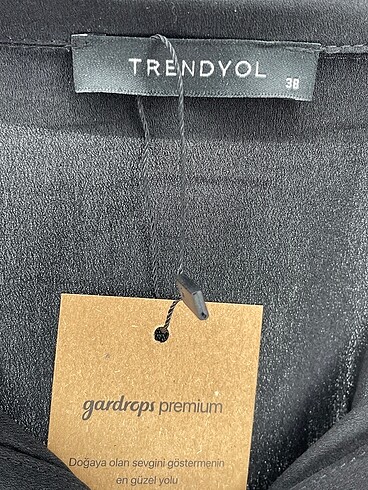 38 Beden siyah Renk Trendyol & Milla Gömlek %70 İndirimli.