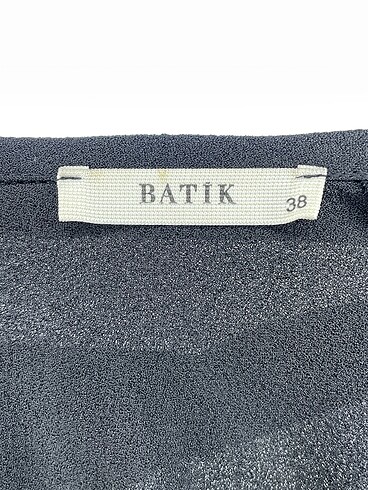 38 Beden siyah Renk Batik Kısa Tulum %70 İndirimli.