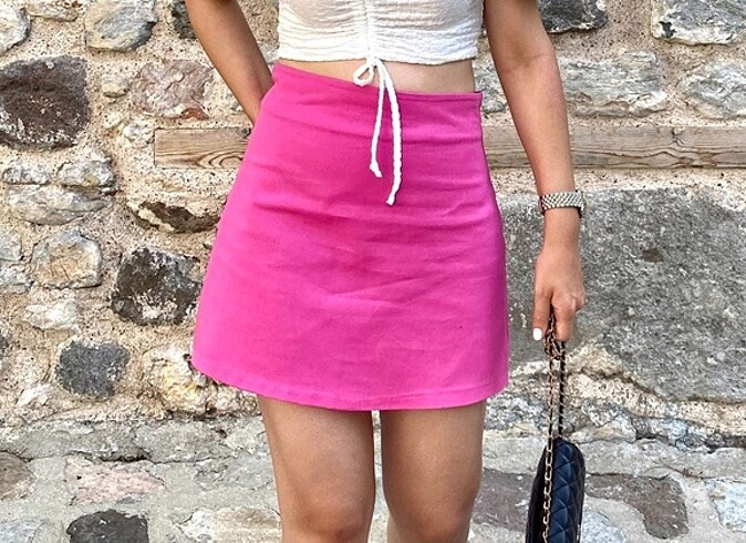 Pembe dokuma etek
