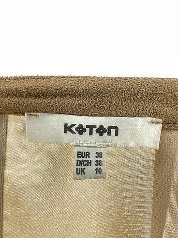 38 Beden kahverengi Renk Koton Bluz %70 İndirimli.