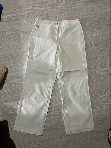 Lacoste kırık beyaz pantolon