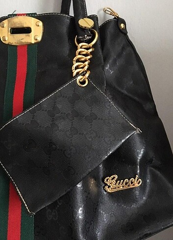 Gucci cuzdan eklemeli deri kol cantasi 