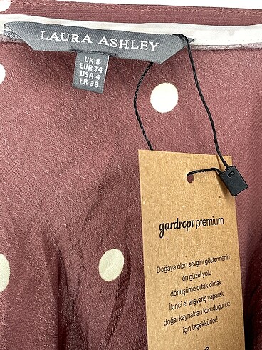 34 Beden çeşitli Renk Laura Ashley Midi Etek %70 İndirimli.