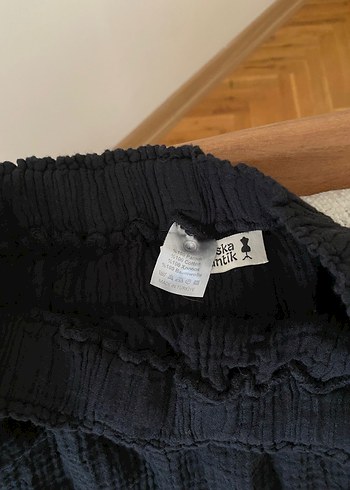 Diğer Yırtmaçlı midi boy etek pamuk kumaş