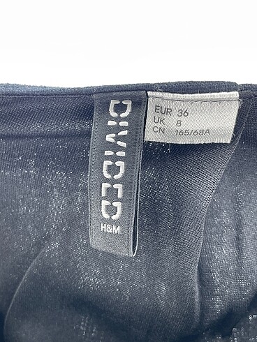 36 Beden siyah Renk H&M Mini Etek %70 İndirimli.