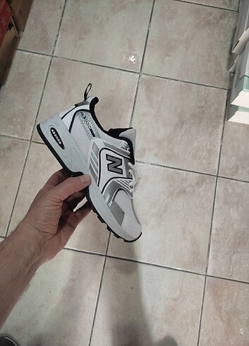 New Balance Spor.