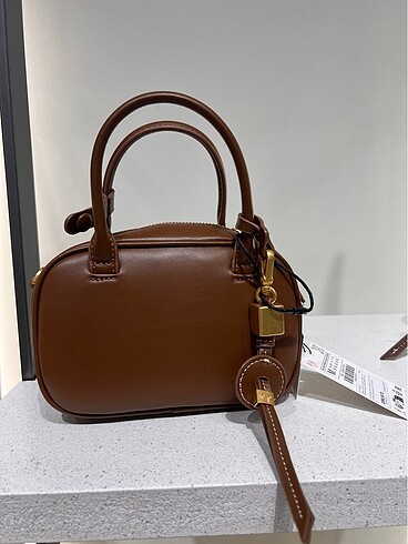 Zara metal saplı mini çanta