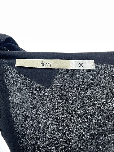 36 Beden siyah Renk Herry Bluz %70 İndirimli.