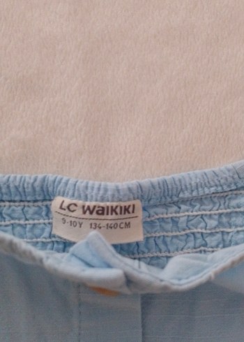 LC Waikiki Mavi Kız Keten Kısa Kollu Bluz