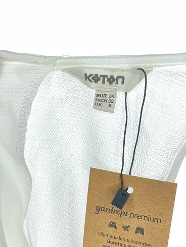 34 Beden beyaz Renk Koton Bluz %70 İndirimli.