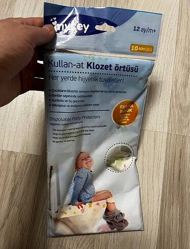 Kullan at klozet örtüsü