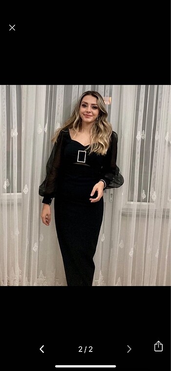 Siyah yırtmaçlı elbise