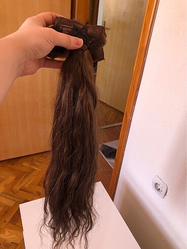 100/100 gerçek insan saçı ,dokusu kalitesi güzel ve yeni alınmış