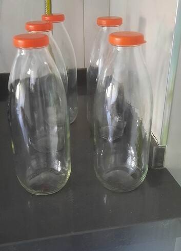 Beden Turuncu kapaklı şişe yaklaşık 1 litre