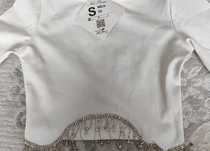 Taşlı şık crop