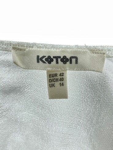 42 Beden beyaz Renk Koton Bluz %70 İndirimli.