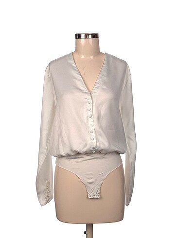 Zara Bluz %70 İndirimli.