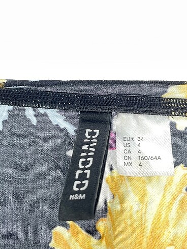 34 Beden çeşitli Renk H&M Kısa Tulum %70 İndirimli.