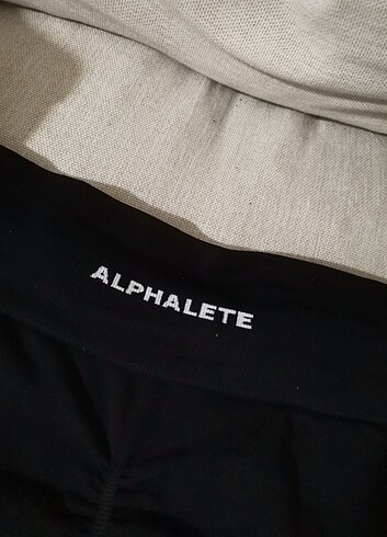 Alphalete büzgülü spor taytı