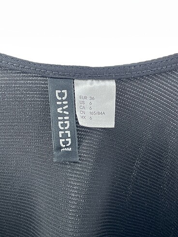 36 Beden siyah Renk H&M Kısa Elbise %70 İndirimli.