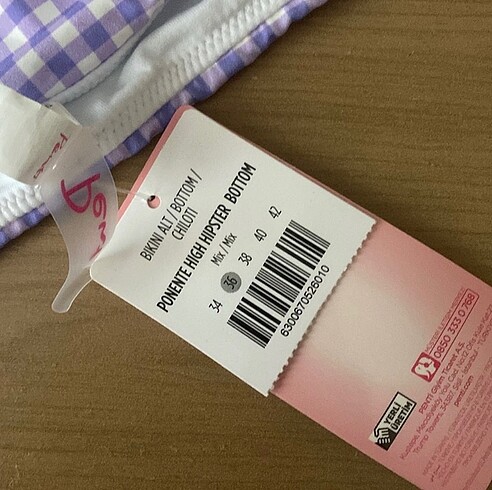 40 Beden etiketli bikini takımı penti