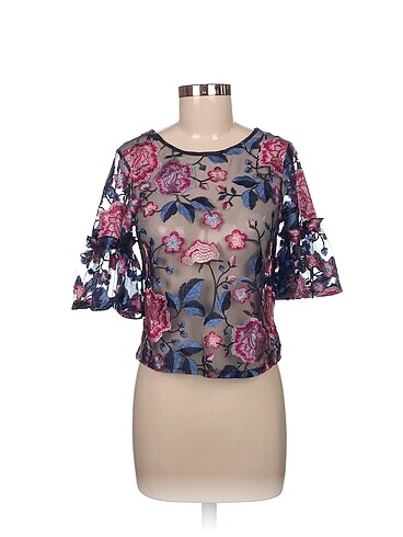 Zara Bluz %70 İndirimli.