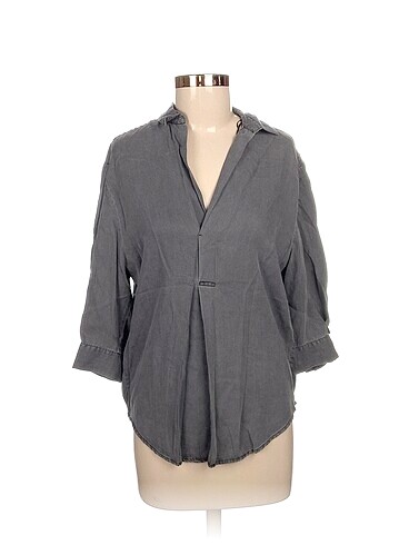 Zara Bluz %70 İndirimli.