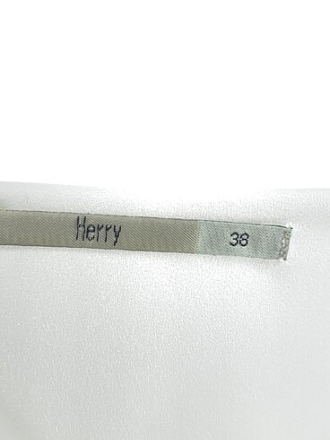 38 Beden beyaz Renk Herry Bluz %70 İndirimli.