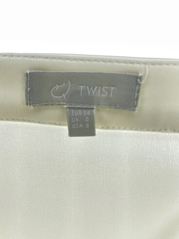 36 Beden beyaz Renk Twist Midi Etek %70 İndirimli.