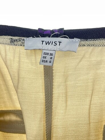 34 Beden çeşitli Renk Twist Düz Kesim %70 İndirimli.