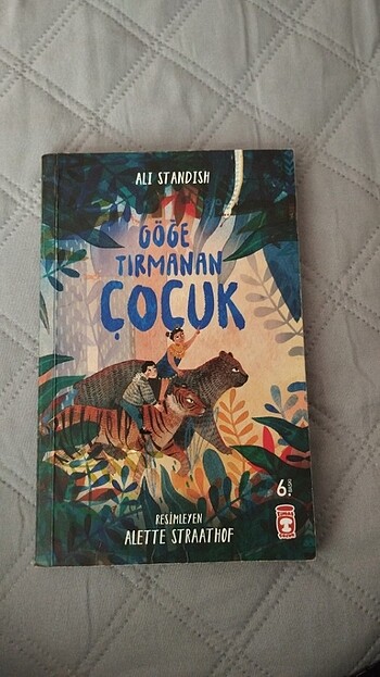 GÖĞE TIRMANAN ÇOCUK 