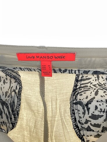 36 Beden ten rengi Renk Mango Mini Şort %70 İndirimli.