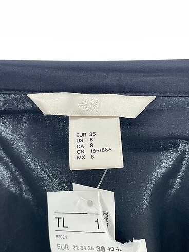 38 Beden siyah Renk H&M Gömlek %70 İndirimli.