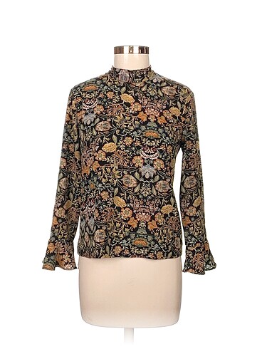 Zara Bluz %70 İndirimli.