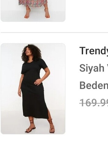 5xl siyah elbise 54 beden giydirir.