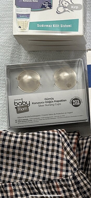 Gümüş göğüs koruyucu kapak