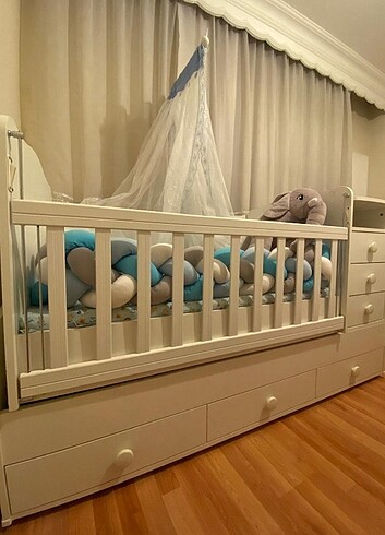 Sallanır büyüyen bebek beşiği 