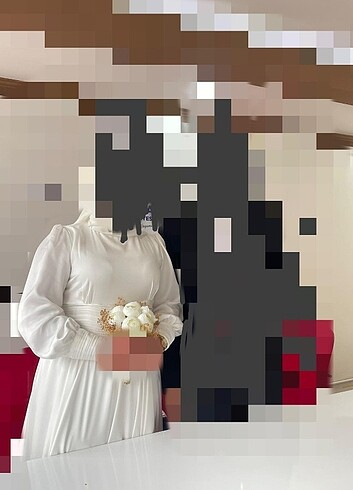 Tesettür beyaz nikah elbisesi