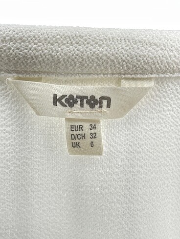 34 Beden beyaz Renk Koton Bluz %70 İndirimli.