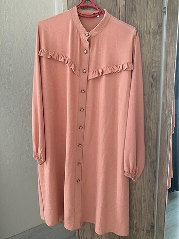 Pudra pembesi tunik