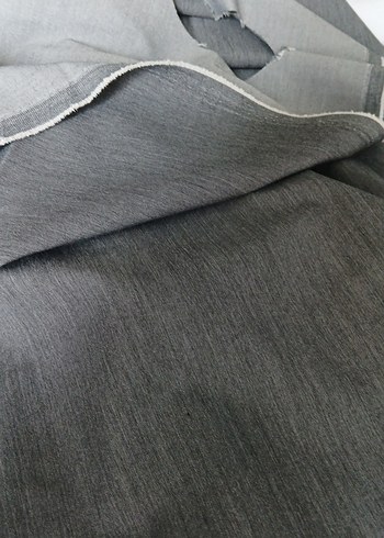  Beden gri, hafif likralı parça kumaş. en 1,50 x boy 1,60 cm dir.
