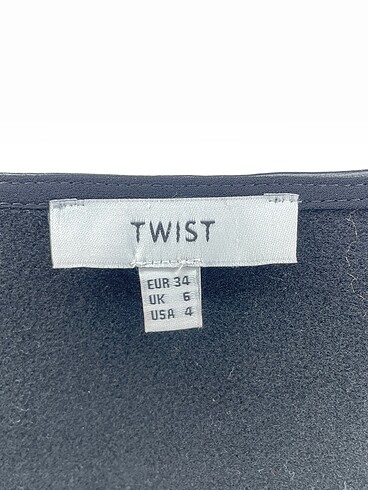 34 Beden siyah Renk Twist Bluz %70 İndirimli.