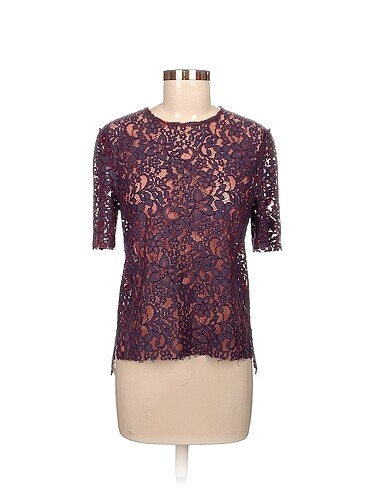 Zara Bluz %70 İndirimli.