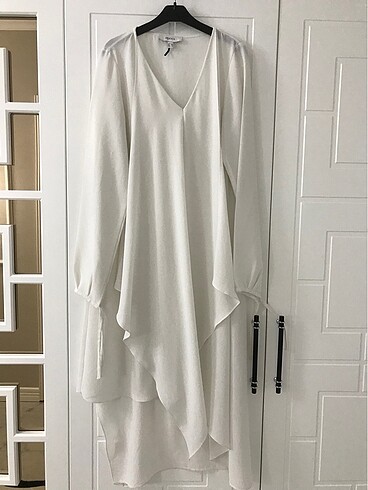 Asimetrik tunik