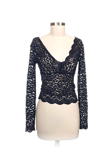 Zara Bluz %70 İndirimli.