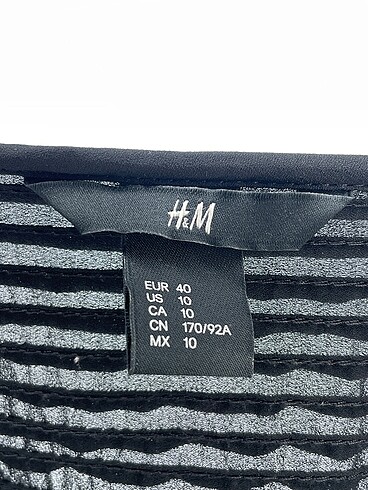 40 Beden siyah Renk H&M Uzun Elbise %70 İndirimli.