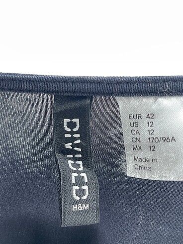 42 Beden siyah Renk H&M Uzun Elbise %70 İndirimli.