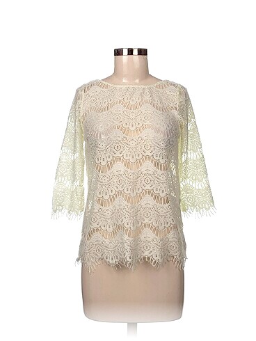 Zara Bluz %70 İndirimli.