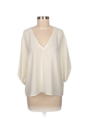 Zara Bluz %70 İndirimli.